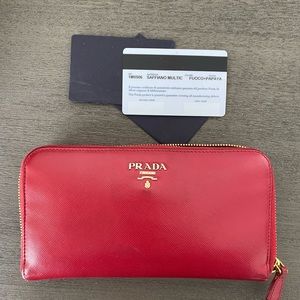 PRADA zip around wallet in red